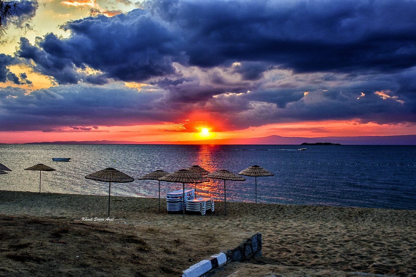Çalış Beach sunset view in Fethiye with orange sky
